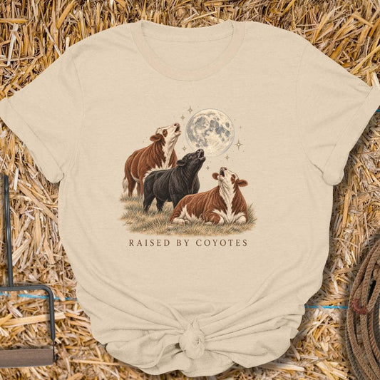 Latigo Cowboy Raised By Coyotes Tee T-Shirt S / Sand