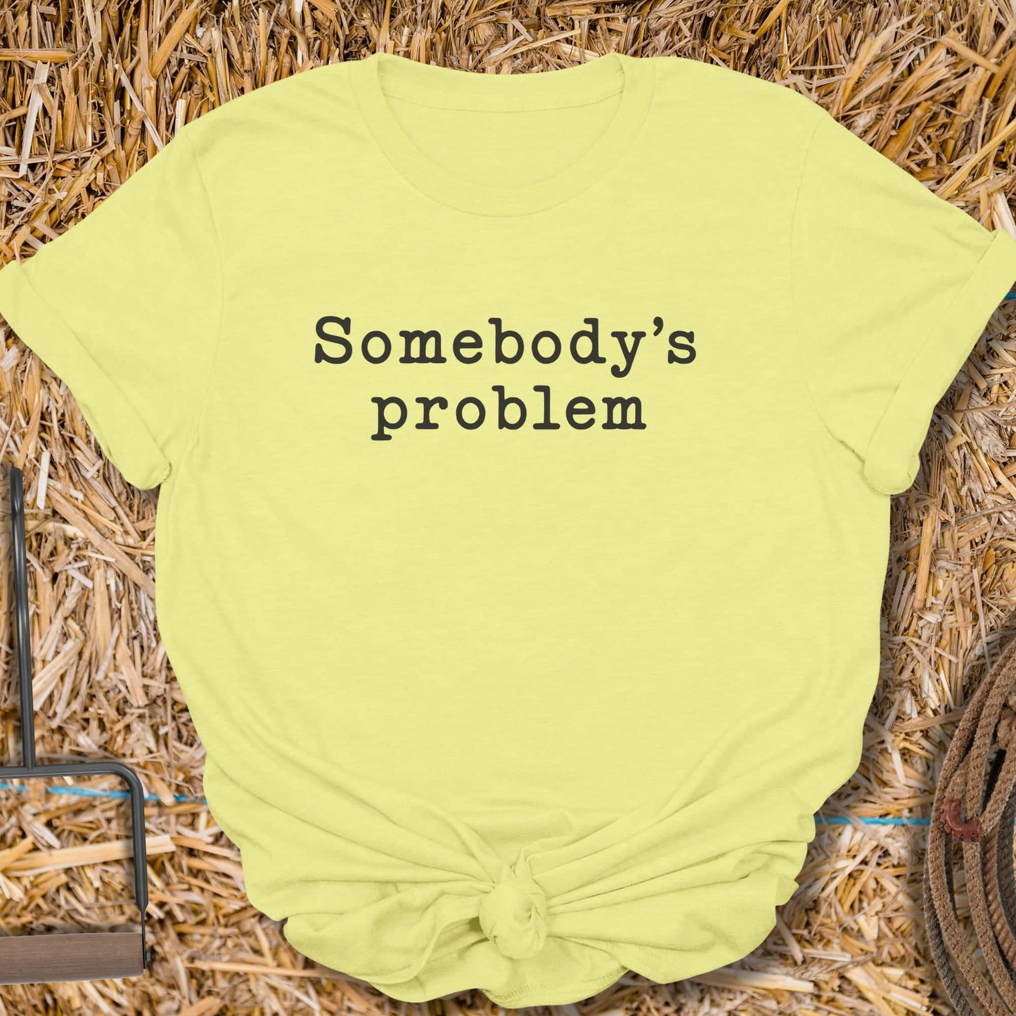 Printify T-Shirt Cornsilk / S Somebodys Problem Tee