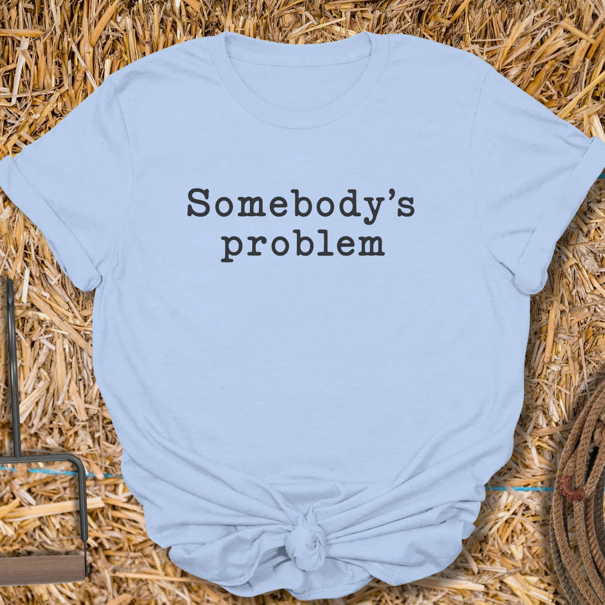 Printify T-Shirt Light Blue / S Somebodys Problem Tee