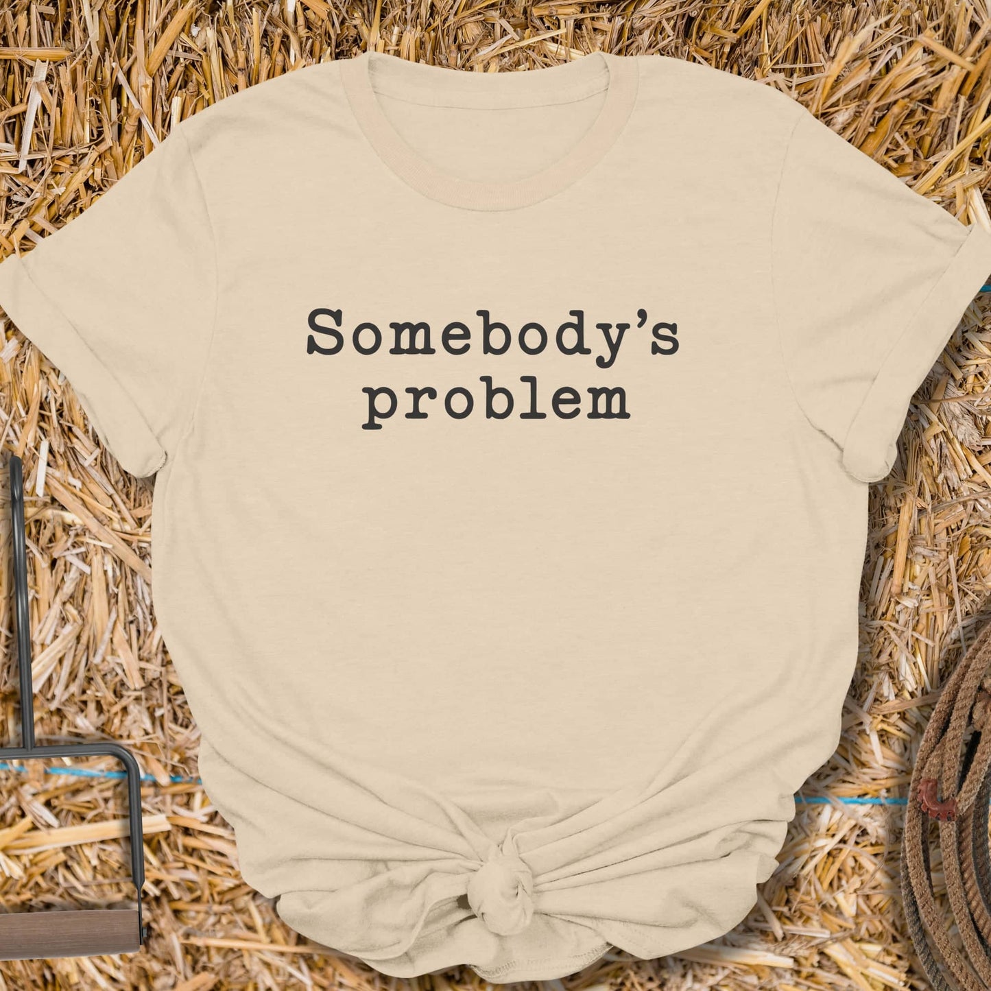 Printify T-Shirt Sand / S Somebodys Problem Tee
